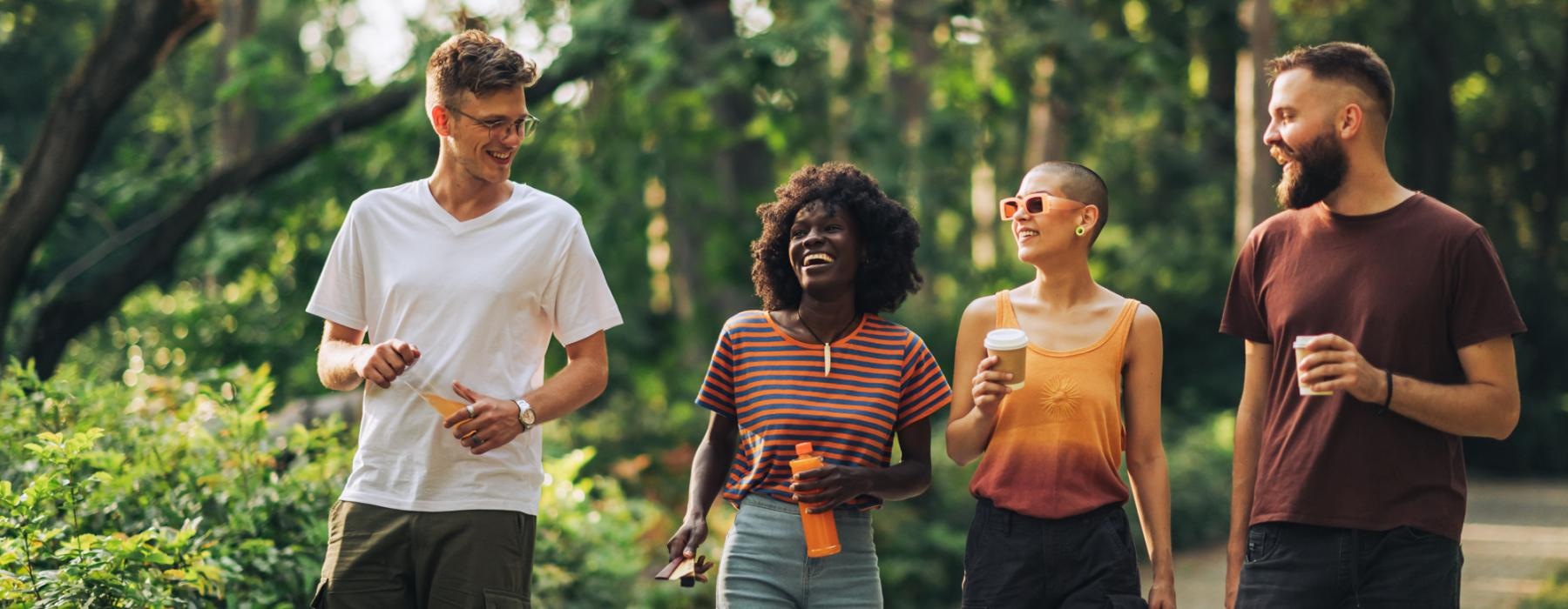 a group of people walking on a path